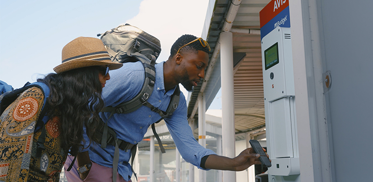 A self-service key kiosk at an Avis rental station