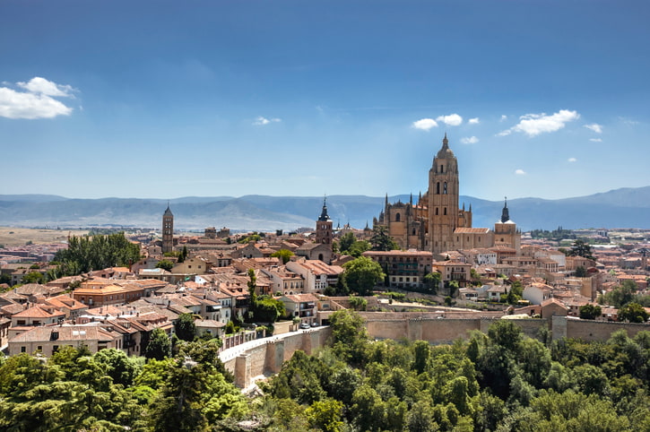 Skyline of Segovia in Central Spain showing stone buildings, towers and ramparts