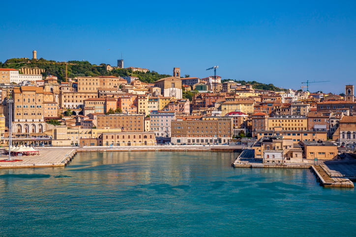 The Italian port city of Ancona with stone buildings and blue Adriatic sea